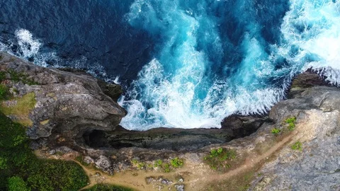 Aerial view by drone 4k camera. Ocean with waves and rocky cliff. 動画素材 86168743