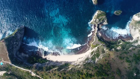 Aerial view by drone 4k camera. Ocean with waves and rocky cliff. Stock Footage 86171717
