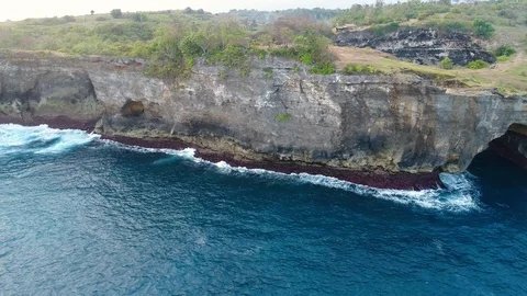 Aerial view by drone 4k camera. Rocky coast with high cliffs Stock Footage 86182762