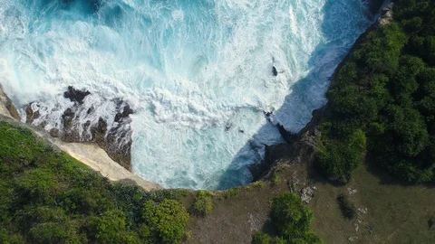 Aerial view by drone 4k camera. Ocean with waves and rocky cliff. Stock Footage 86183608