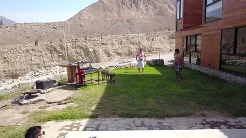 Aerial view of drone approaching a man and getting scared thinking that he would Stock Footage 199570502