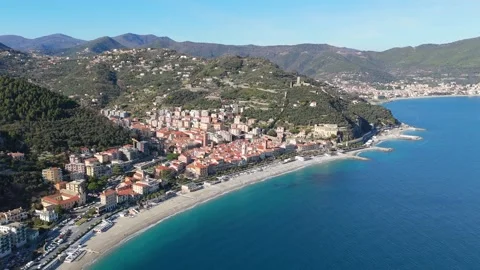 Aerial view from a drone approaching the town of Noli and its beach Stock Footage 328243241