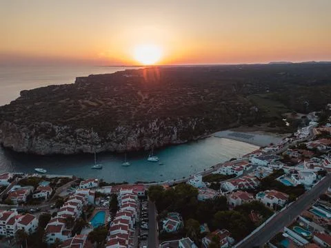 Aerial view drone boat docked mediterranean tropical beach Spain Cala en Porter Stock Photos