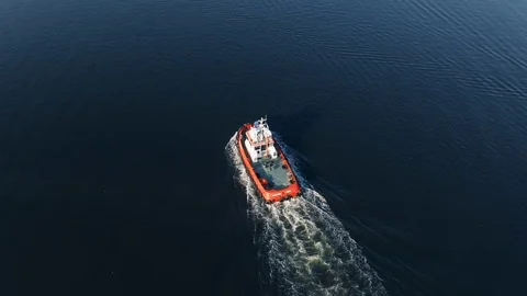 Aerial view drone a calm surface of sea water floating pilot ship blue surface Stock Footage 119212139