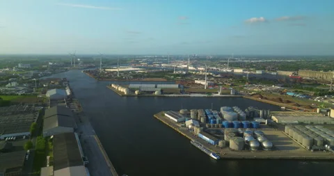 Aerial view from a drone of a cargo canal ship passes by over the canal on a Vídeo Stock 244780337