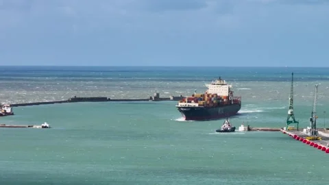 Aerial view by drone of a container ship in Le Havre seaport 03 Video stock 330669355