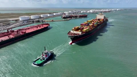 Aerial view by drone of a container ship in Le Havre seaport 08 Video stock 330669360