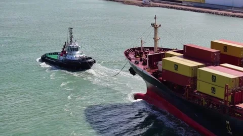 Aerial view by drone of a container ship in Le Havre seaport 09 Video stock 330669362