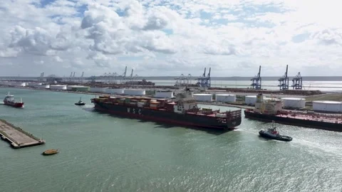 Aerial view by drone of a container ship in Le Havre seaport 10 Vidéo 330669364