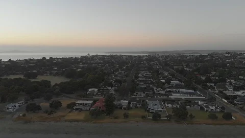Aerial view drone decending over Big Manly suburb by beach Stock Footage 102801966