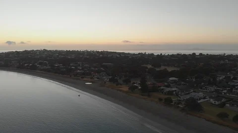 Aerial view drone decending over Big Manly suburb by beach Stock Footage 102804425