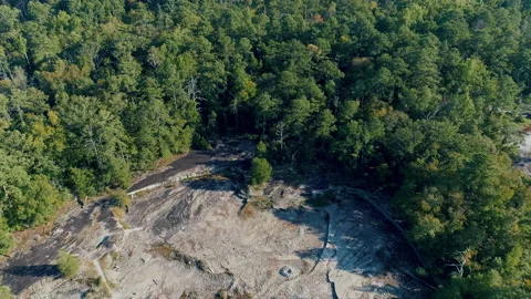 Aerial View of Drone Descending Into Desolate Wasteland Mountain Stock Footage 130866679