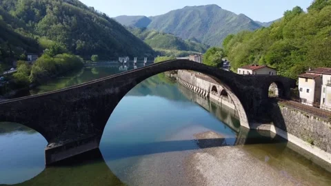 Aerial view with drone on the devil's bridge in a spring day. Borgo a Mozzano Stock Footage 232288962