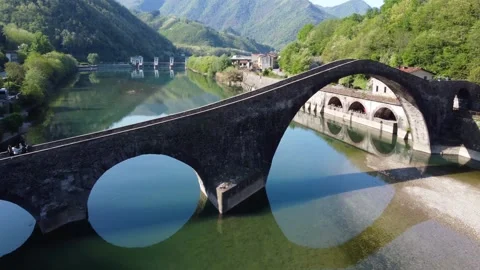 Aerial view with drone on the devil's bridge in a spring day. Borgo a Mozzano Stock Footage 236951563