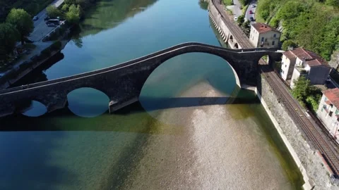 Aerial view with drone on the devil's bridge in a spring day. Borgo a Mozzano Stock Footage 236951937