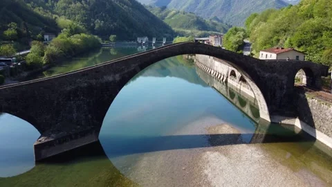 Aerial view with drone on the devil's bridge in a spring day. Borgo a Mozzano Stock Footage 236952042