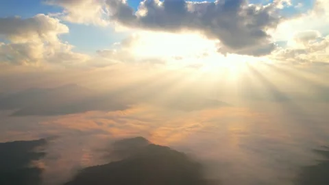 Aerial view from drone, Epic sunbeam over sea of clouds mountains. Stock Footage 167991709