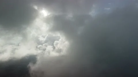 Aerial view. The drone flies over foggy and fluffy clouds. Blue sky sun and sea Stock Footage 220481200