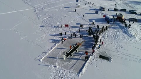 Aerial view of drone flight custom to swim in icy cold frost water Stock Footage 147011219