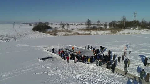 Aerial view of drone flight custom to swim in icy cold frost water Stock-Footage 147246975