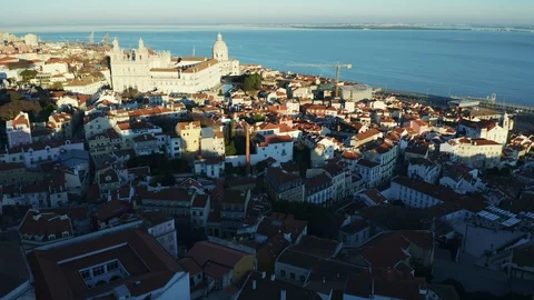 Aerial view; drone flight forward over the city Lisbon, Portugal Stock Footage 104411295