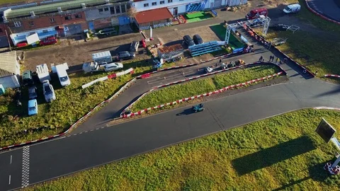 Aerial view; drone flight over kart racing or karting, buggy cross Video stock 98738199