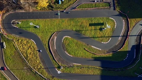Aerial view; drone flight over kart racing or karting, buggy cross Video stock 98739201