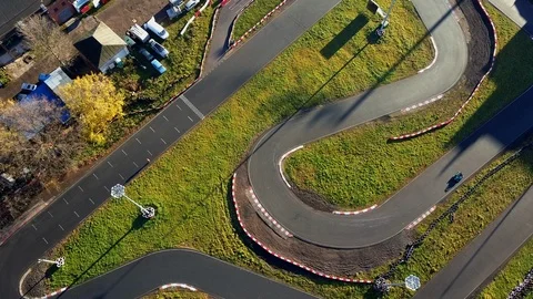 Aerial view; drone flight over kart racing or karting, buggy cross Video stock 98739345