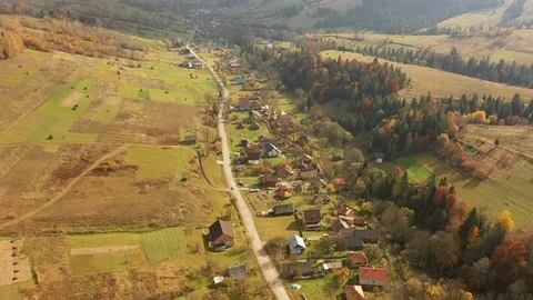 Aerial View Drone Flight over dramatic autumn mountain landscape. Green meado Stockbeeldmateriaal 118393907