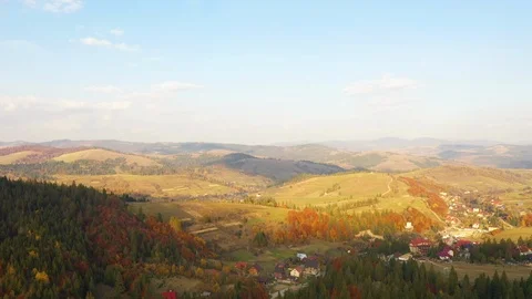 Aerial View Drone Flight over dramatic autumn mountain landscape. Green meado Stockbeeldmateriaal 118394206