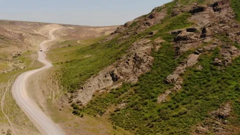 Aerial view, drone flight over mountains and wild green forest. Stock Footage 154494000