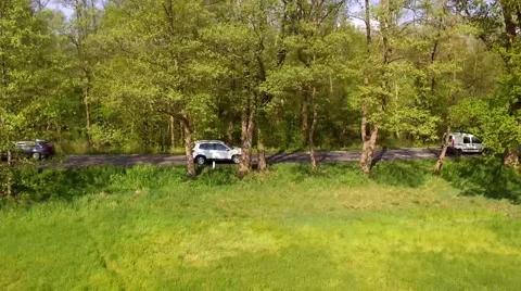 Aerial view drone fly - a car drive on a road in germany Stock Footage 62929954