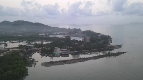 Aerial view of drone fly over coast near sea in early morning Video stock 153403254