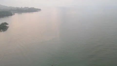 Aerial view of drone fly over two boats that go to land and back from working Stock-Footage 153408358