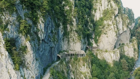 Aerial view; drone flying between two stony walls Stock Footage 118294470