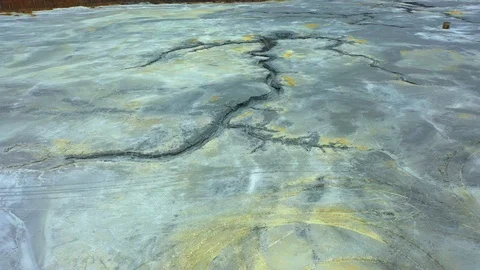 Aerial view; drone flying forward over a polluted river with destroyed ecosystem Stock-Footage 118284616