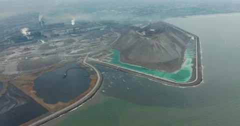Aerial view. drone flying forward over a polluted sea with destroyed ecosystem Stock Footage 126903909
