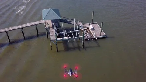 Aerial view of drone flying over docks and water. Stock Footage 89626430