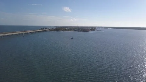 Aerial view of drone flying over sailboat anchorage in the florida keys Stock Footage 101062383