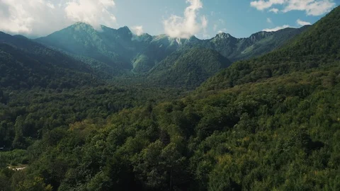 Aerial view; drone flying over streets of mountain village Stock Footage 117431306