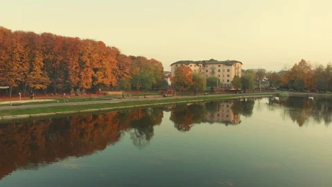 Aerial view of drone flying over a beautiful lake with an island , Kolomyia Stock Footage 118250041