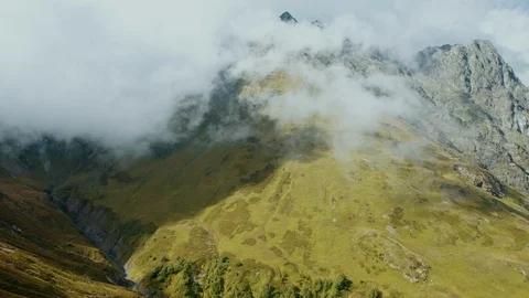 Aerial view; drone flying over foggy mountain Stock Footage 119005755
