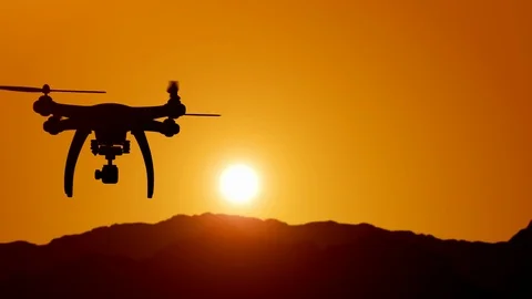 Aerial view of drone flying over mountains into the clouds during magical sunset Stock Footage 123301226
