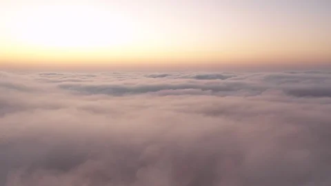 Aerial view from a drone flying over thick fog. Stock Footage 126282886