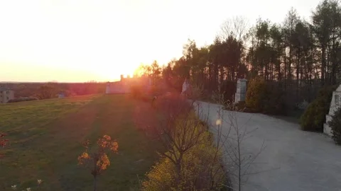 Aerial view from drone flying over path along Way of the Cross in red sunset. Stock Footage 148653693