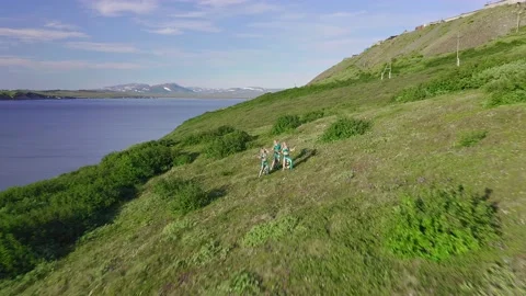 Aerial view from drone flying over of a three of European women in exotic 스톡 동영상 151045176