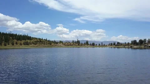 Aerial view of drone flying over the Radian lagoon that filters water from Stock Footage 164597845