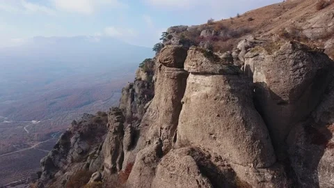 Aerial view of a drone flying over sharp rocky outcrops. Video stock 169283536
