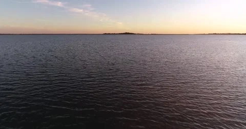 Aerial view of drone flying over beautiful sea. Flying above sea water surface Stock Footage 196322138