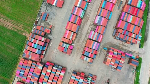 Aerial view from a drone flying over a many cargo containers Stock Footage 210786529